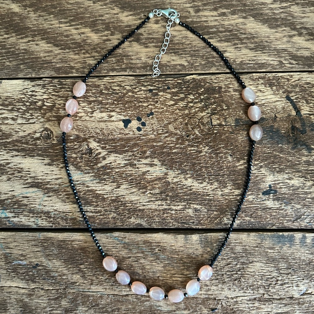 Short, black necklace with beading